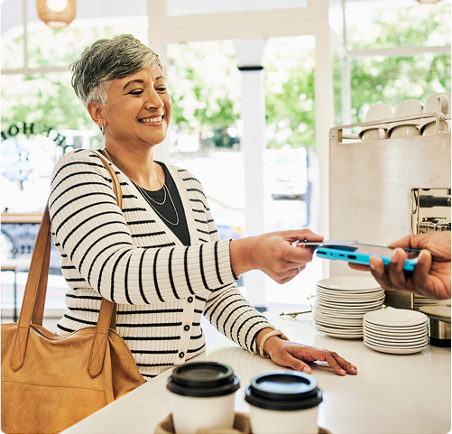 Young woman eating at a restaurant